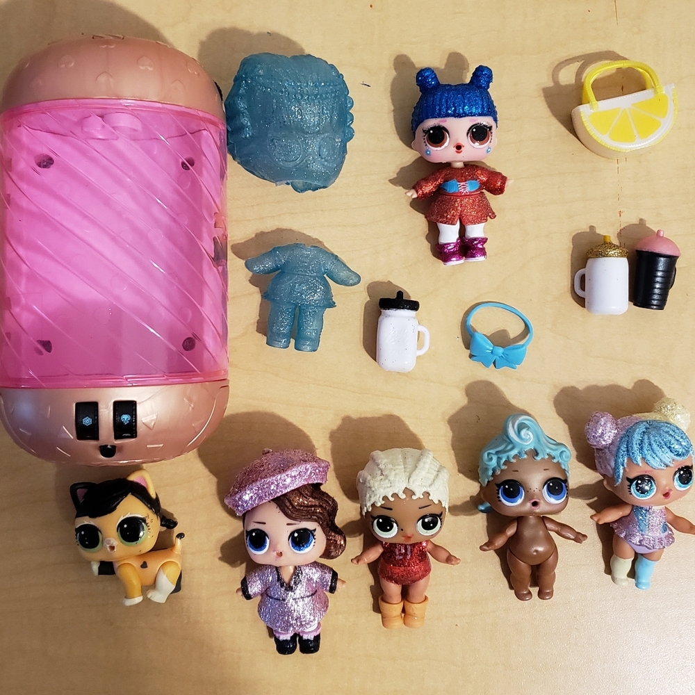 Lot of LOL dolls, pet and accessories.